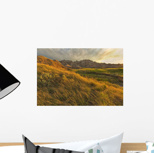 Sunset over the landscape of badlands national park Wall Mural