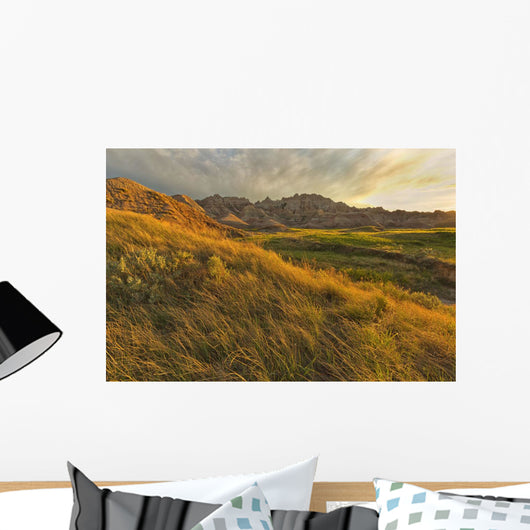Sunset over the landscape of badlands national park Wall Mural