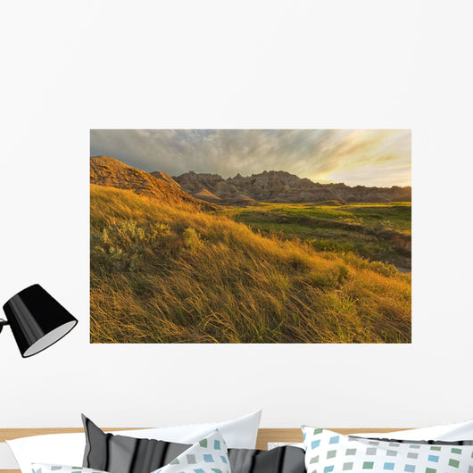 Sunset over the landscape of badlands national park Wall Mural