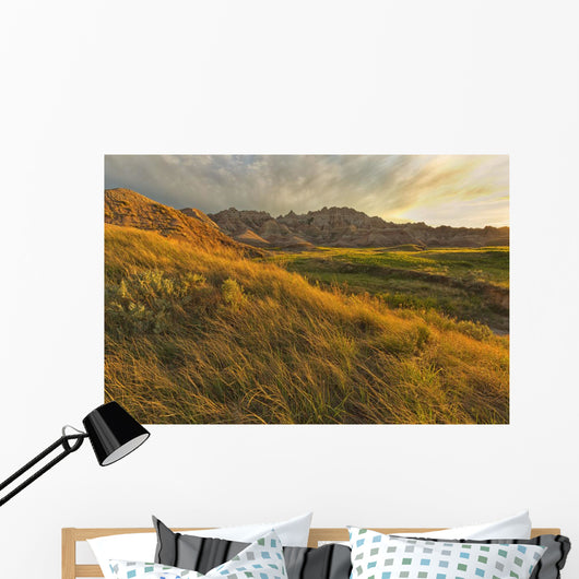 Sunset over the landscape of badlands national park Wall Mural