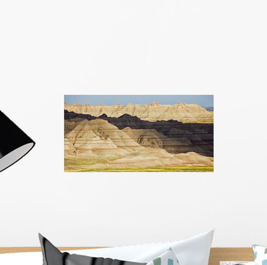 Light and shadows paint the landscape of badlands national park Wall Mural