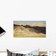 Light and shadows paint the landscape of badlands national park Wall Mural