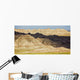 Light and shadows paint the landscape of badlands national park Wall Mural