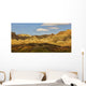 Dramatic light on the eroded formations of badlands national park Wall Mural