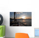 Sailing boat in the sea at sunset Wall Mural