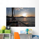 Sailing boat in the sea at sunset Wall Mural