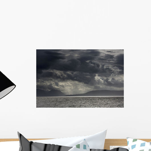 Dramatic sky with dark storm clouds Wall Mural