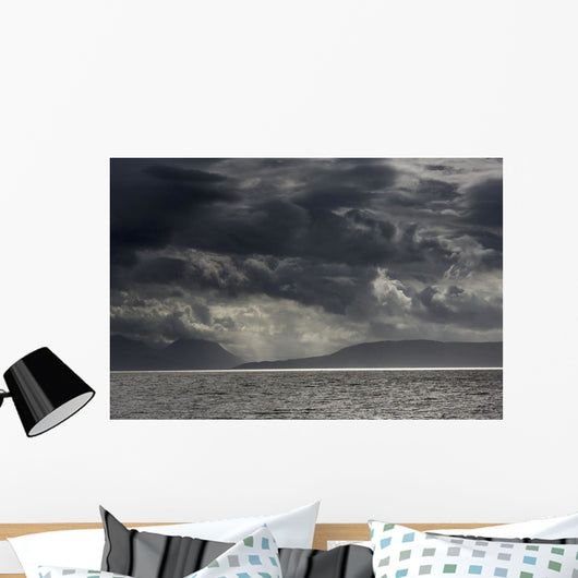 Dramatic sky with dark storm clouds Wall Mural