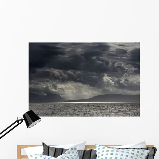 Dramatic sky with dark storm clouds Wall Mural
