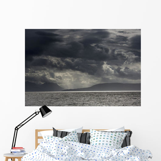 Dramatic sky with dark storm clouds Wall Mural