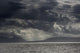 Dramatic sky with dark storm clouds Wall Mural