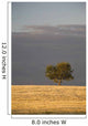 A single tree in a golden field at sunrise;Alberta canada Wall Mural