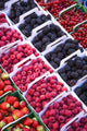Berries in boxes at a food market;Sault vaucluse provence france Wall Mural