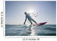Kitesurfer illuminated by the sunlight Wall Mural