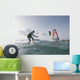 Kitesurfer and windsurfer along the coast Wall Mural