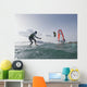 Kitesurfer and windsurfer along the coast Wall Mural