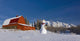 Snowman Dressed Up As A Cowboy Standing In Front Of A Vintage Red Barn Wall Mural