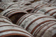 Whisky barrels in a distillery Wall Mural