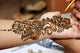 Applying henna on hand Wall Mural