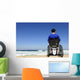 man in a wheelchair watching the sea Wall Mural