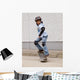 child skateboarding with helmet, knee pads and elbow protection Wall Mural