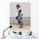 child skateboarding with helmet, knee pads and elbow protection Wall Mural