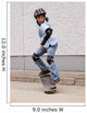 child skateboarding with helmet, knee pads and elbow protection Wall Mural