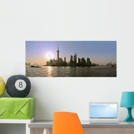 Sun Rises behind Skyline Wall Decal