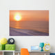 Sunset through windblown snow creates a sundog above the Beaufort Sea Wall Mural