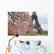 Spring in Paris. Blossoming jacarandas and the Eiffel Tower Wall Mural