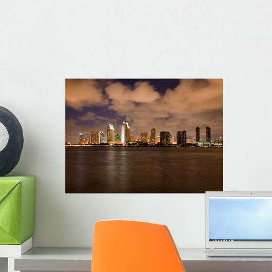 Orange clouds reflect light from San Diego Skyline Wall Mural