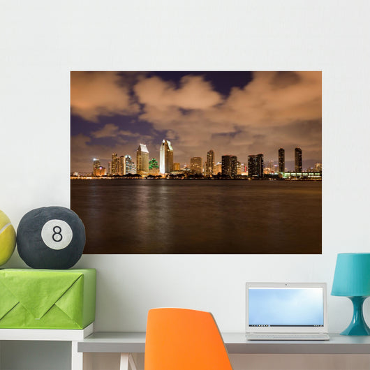 Orange clouds reflect light from San Diego Skyline Wall Mural
