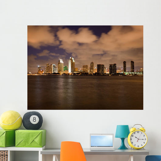 Orange clouds reflect light from San Diego Skyline Wall Mural