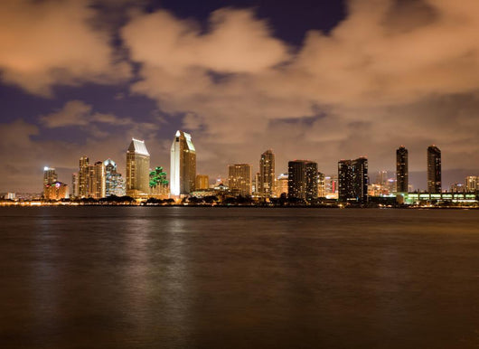 Orange clouds reflect light from San Diego Skyline Wall Mural