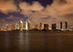 Orange clouds reflect light from San Diego Skyline Wall Mural