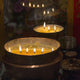 Flames burning in a row in large bronze pots;Lhasa xizang china Wall Mural