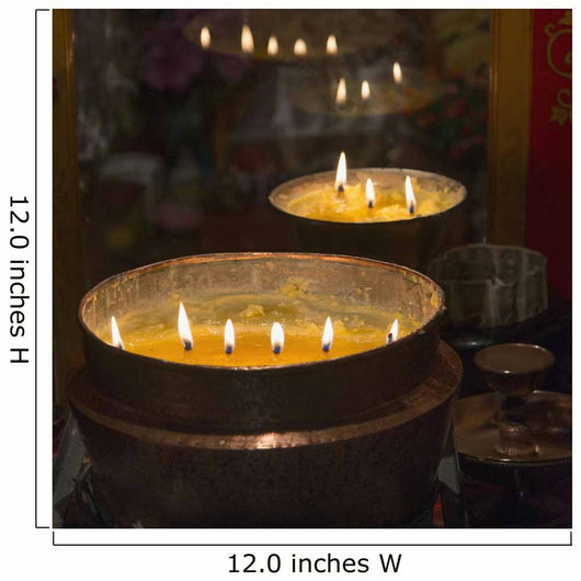 Flames burning in a row in large bronze pots;Lhasa xizang china Wall Mural