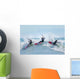 Three kitesurfers in water Wall Mural