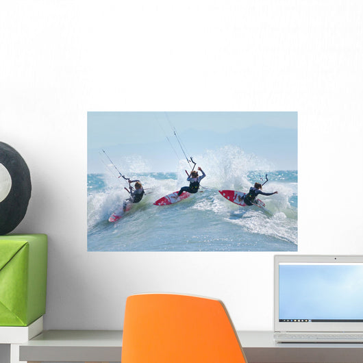 Three kitesurfers in water Wall Mural