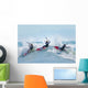 Three kitesurfers in water Wall Mural