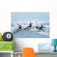 Three kitesurfers in water Wall Mural