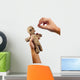 hands holding creepy voodoo doll with needles isolated on white Wall Decal