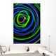 Silhouette of woman spinning hula-hoop lit with LEDs in field at night Wall Mural