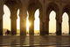 Morocco, Archways of Hassan II mosque at dusk Wall Mural
