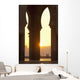 Morocco, Looking through arches of Hassan II mosque to couple chatting Wall Mural