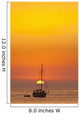 Spain, People watching sunset from yacht moored off Benirras beach Wall Mural