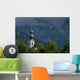 Germany, Stormy clouds behind Ruhpolding church Wall Mural