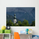 Germany, Stormy clouds behind Ruhpolding church Wall Mural