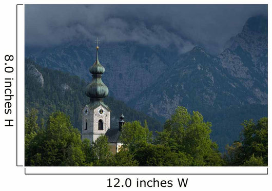 Germany, Stormy clouds behind Ruhpolding church Wall Mural