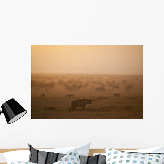 Kenya, Hyena with cubs at dawn in Ol Pejeta Conservancy Wall Mural